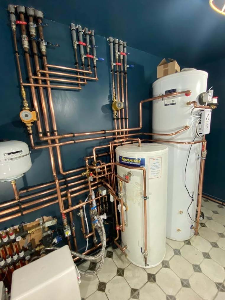 MYKONOS plumbing expert working on residential systems